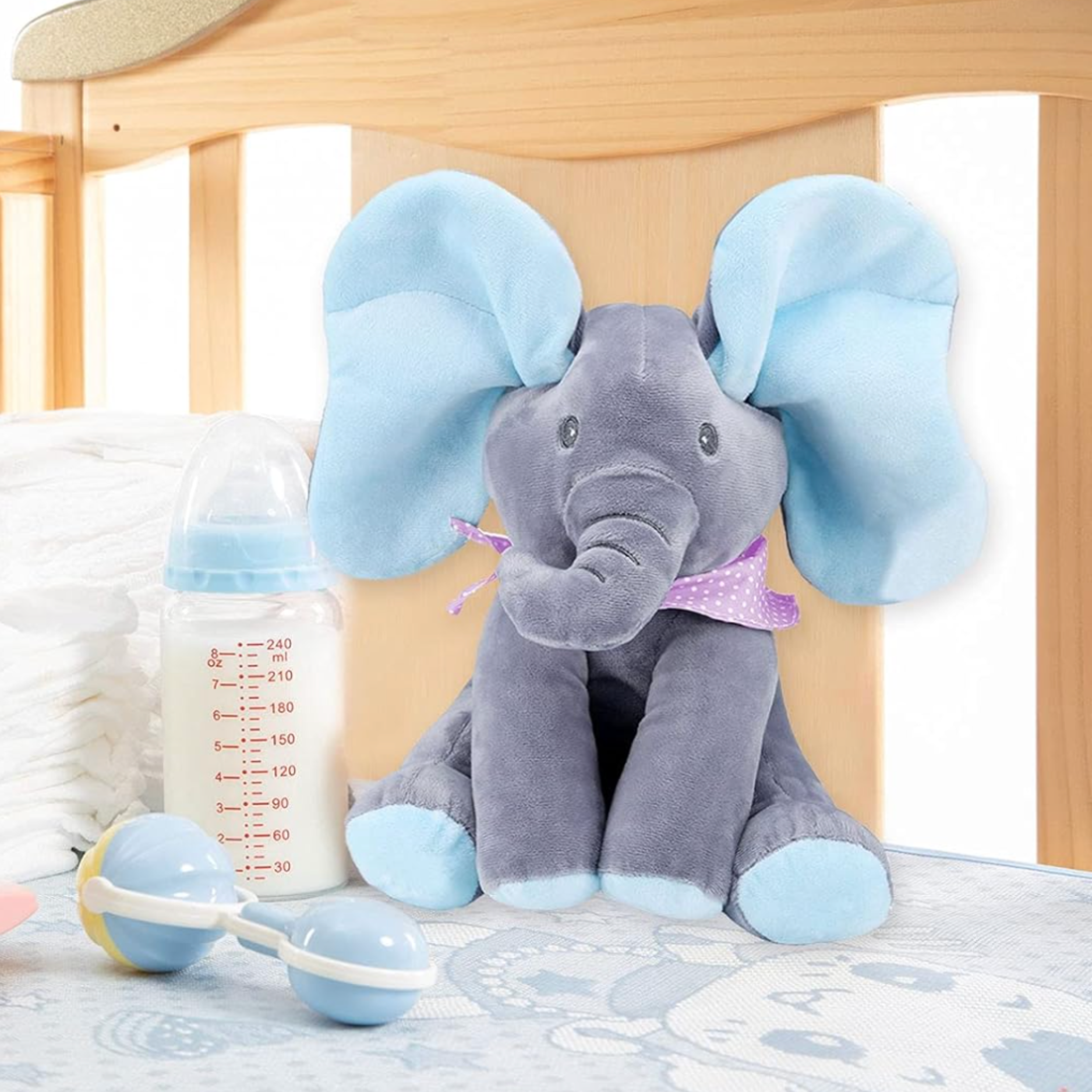 Peluche interactivo de elefante con orejas móviles